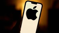 The Apple logo is seen on an iPhone.